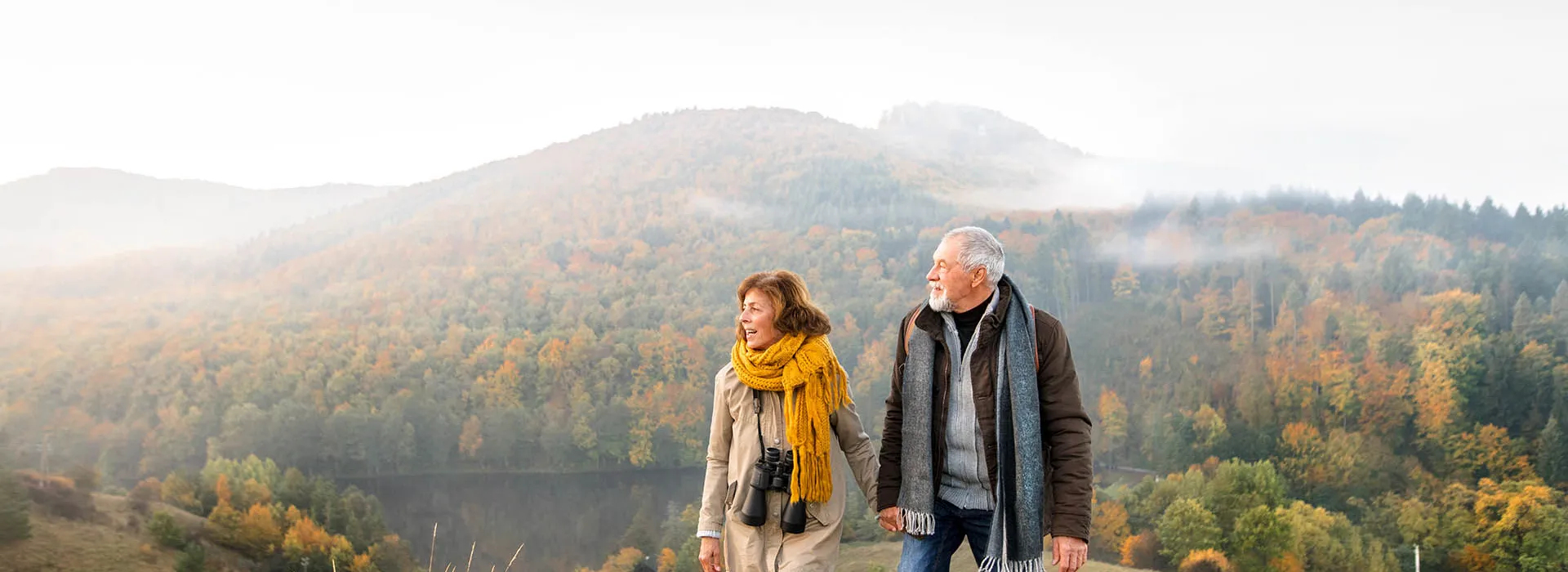 couple enjoying nature in autumn
