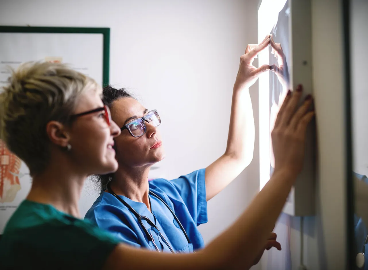 doctors looking at scan